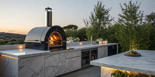 Alfa Forni countertop pizza oven on a modern outdoor kitchen counter.